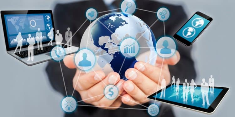 Businessman holds modern technology in hands.